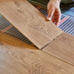 When installing laminate flooring where do you start?