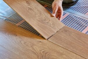 When installing laminate flooring where do you start?